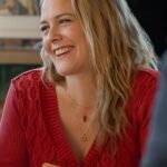 A-Merry-Little-Ex-Mas-2025-Alicia-Silverstone-Red-Cardigan